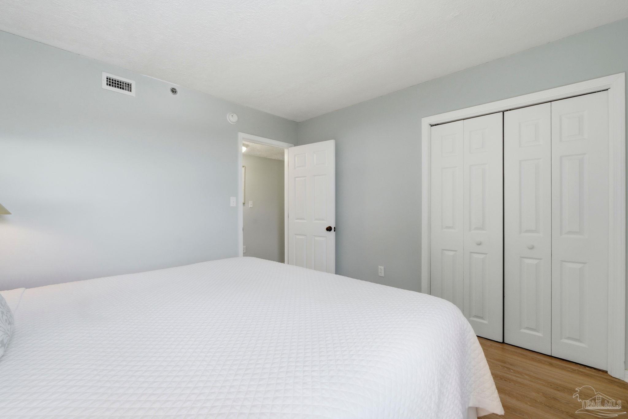 14623 Perdido Key Drive, Unit W201 Perdido Key, FL 32507 - Photo 35 of 57 a large white bed in a white room