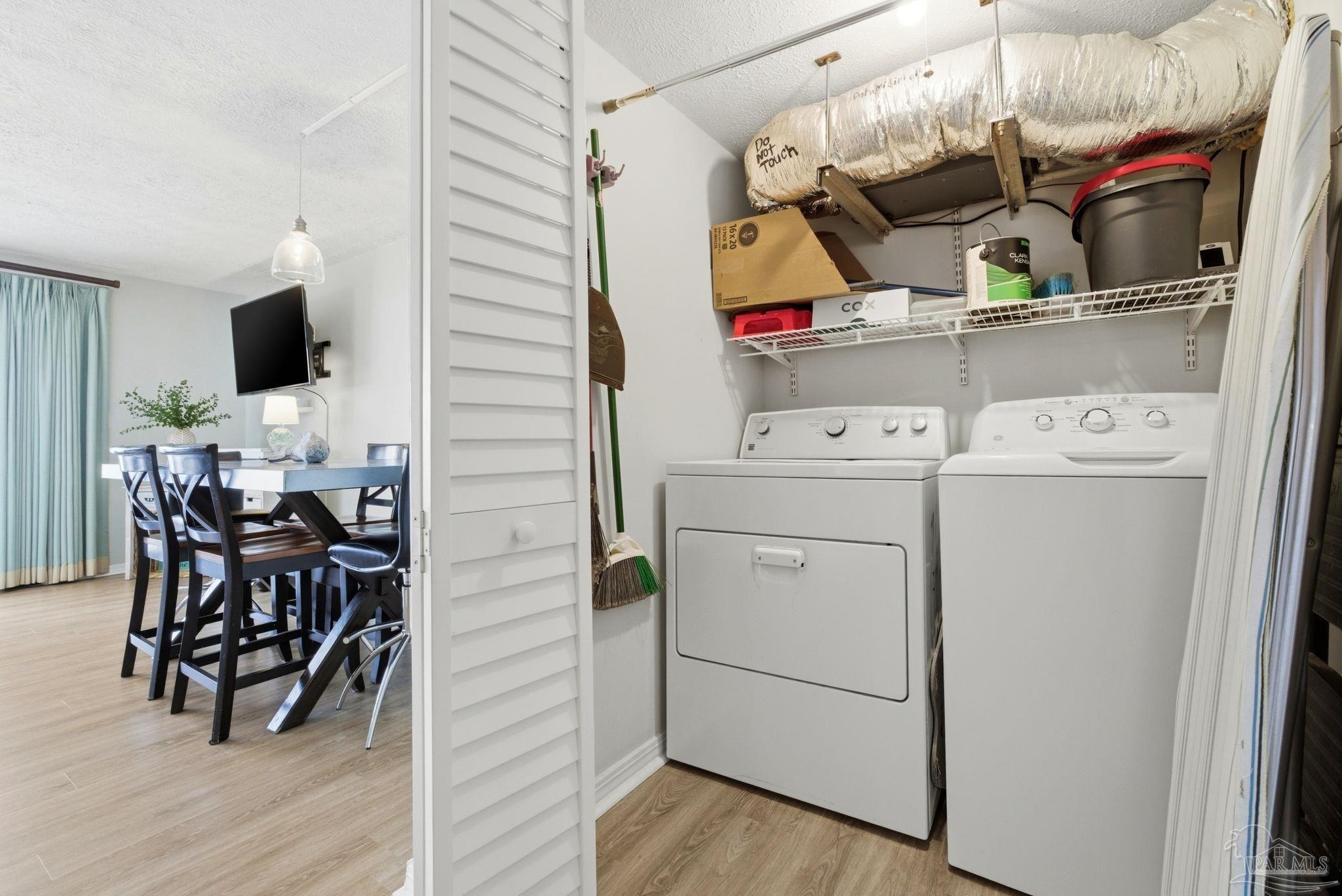 14623 Perdido Key Drive, Unit W201 Perdido Key, FL 32507 - Photo 38 of 57 a view of dining room and wooden floor