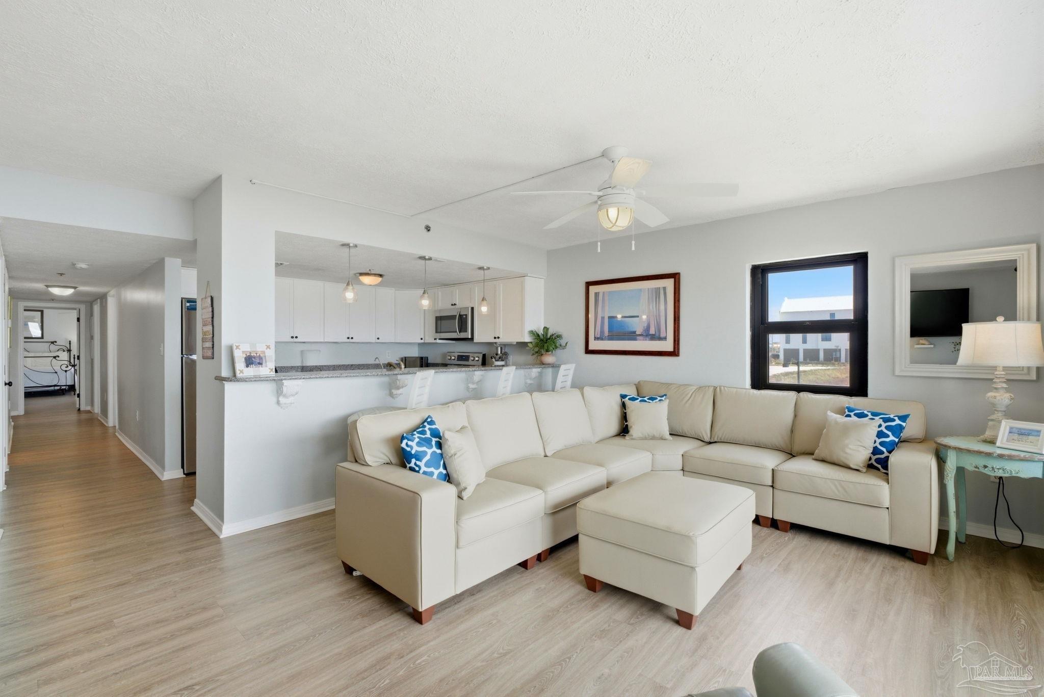14623 Perdido Key Drive, Unit W201 Perdido Key, FL 32507 - Photo 5 of 57 a living room with furniture and a wooden floor