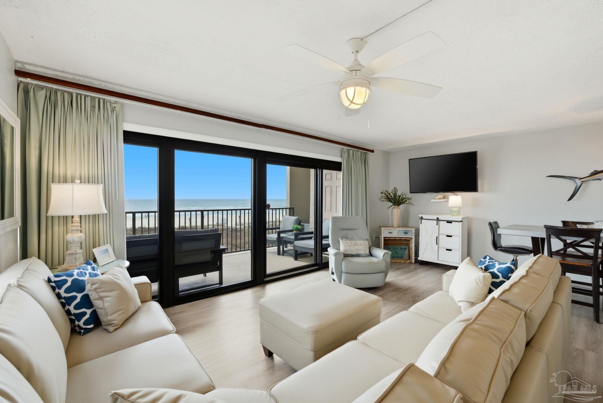 14623 Perdido Key Drive, Unit W201 Perdido Key, FL 32507 - Photo 6 of 57 a living room with furniture and a flat screen tv