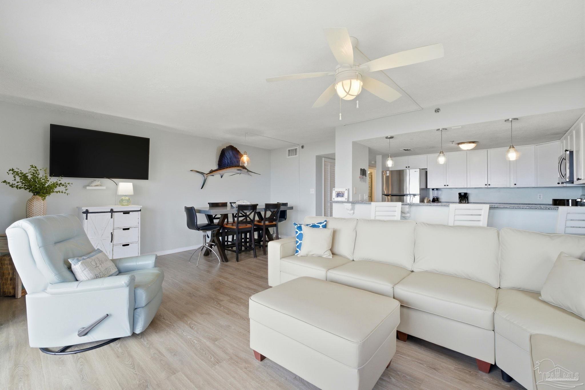 14623 Perdido Key Drive, Unit W201 Perdido Key, FL 32507 - Photo 8 of 57 a living room with furniture and a flat screen tv