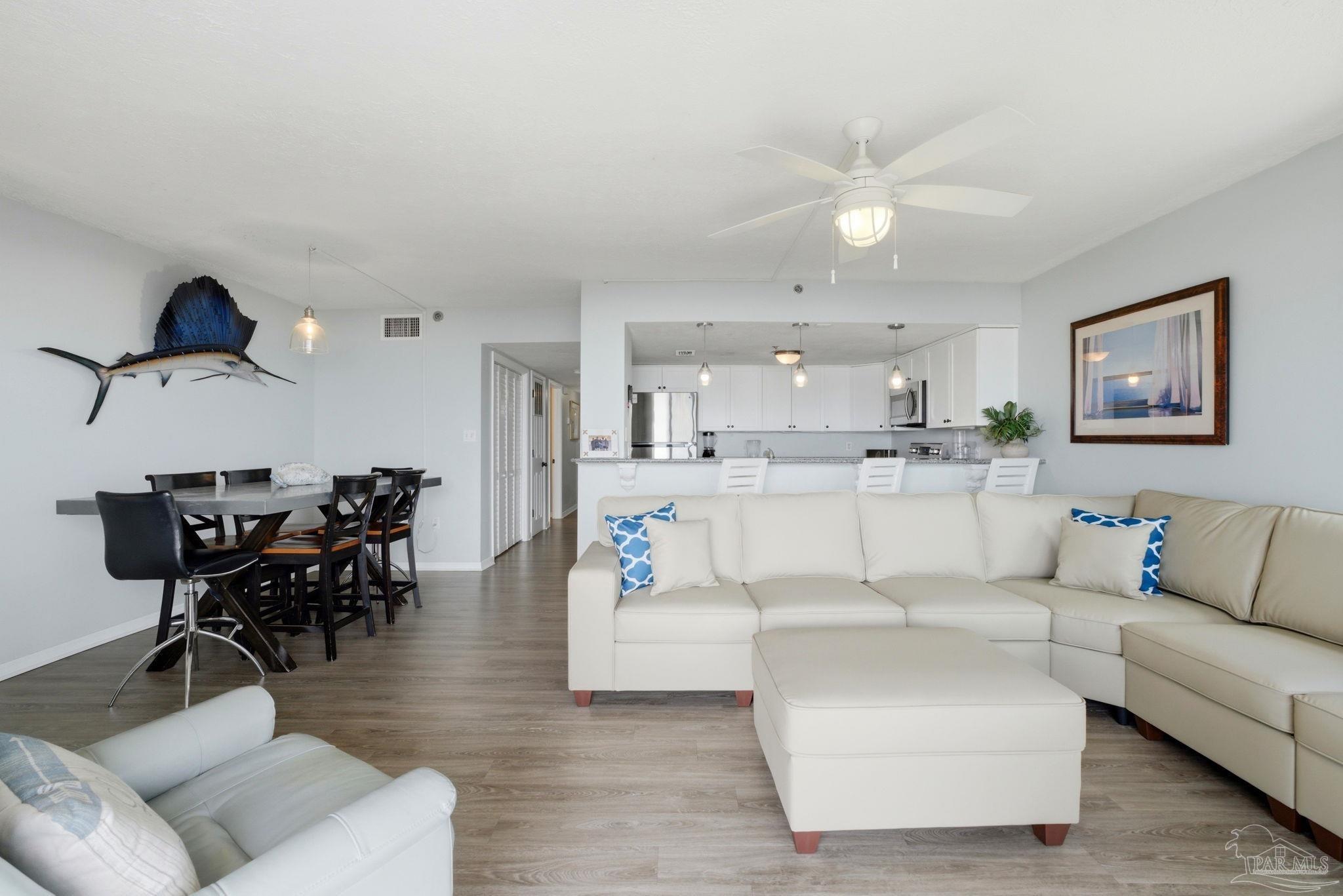 14623 Perdido Key Drive, Unit W201 Perdido Key, FL 32507 - Photo 9 of 57 a living room with furniture and view of kitchen