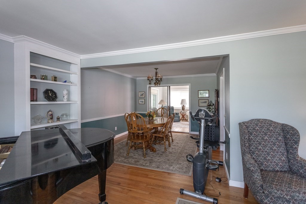 104 Gilbert Road Southampton, MA 01073 - Photo 8 of 42 a dining room with furniture and wooden floor