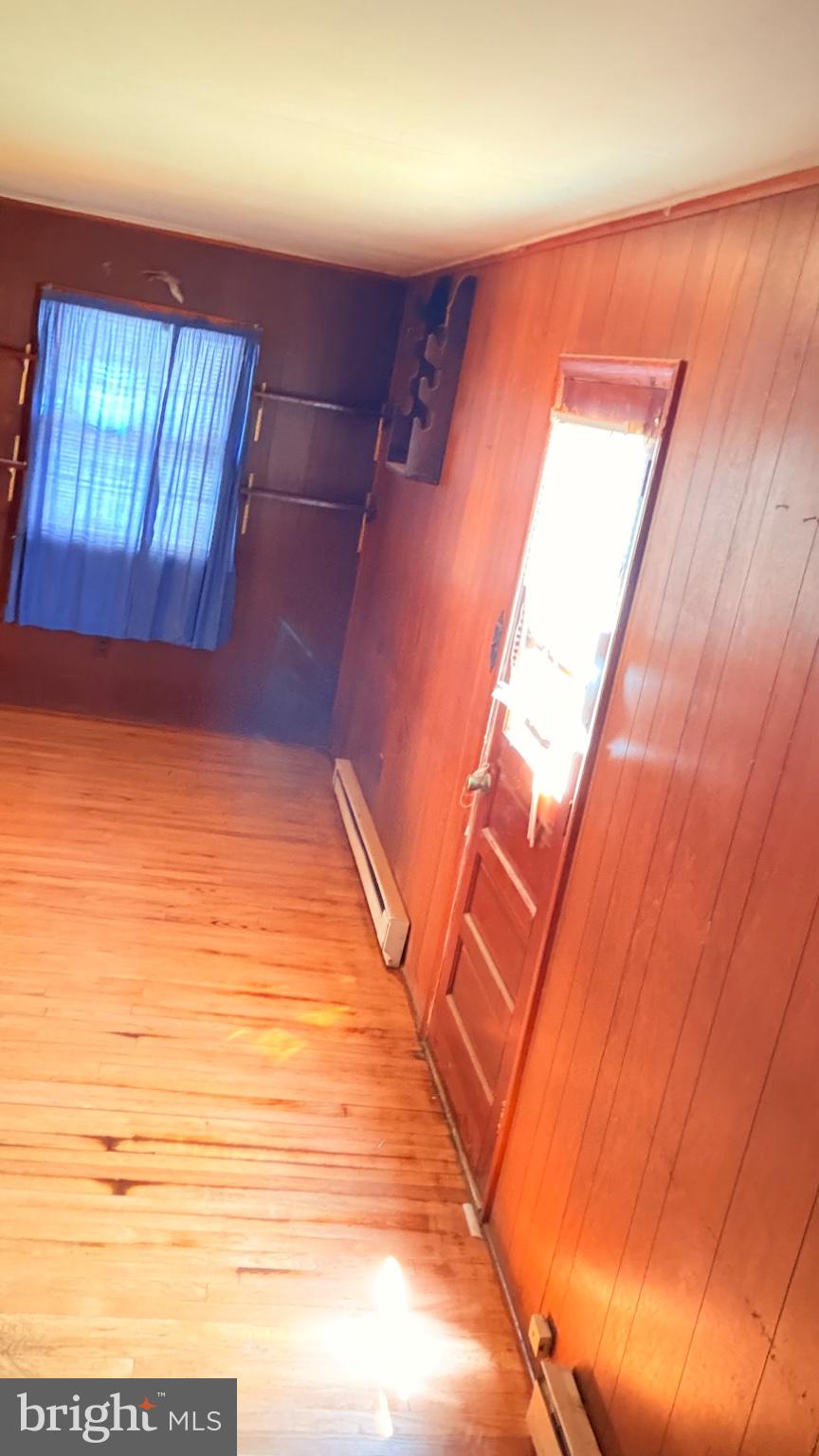 711 Rigby Avenue Cambridge, MD 21613 - Photo 16 of 21 Cozy room with warm wooden tones.