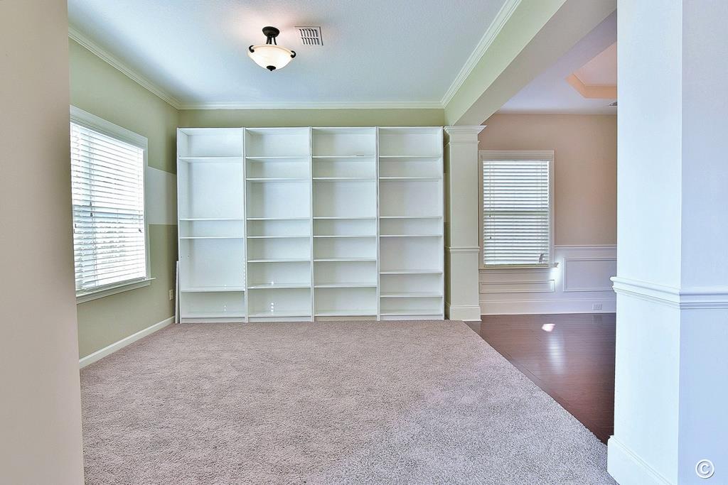 9533 Yarbrough Road Midland, GA 31820 - Photo 5 of 29 wooden floor in an empty room with a window
