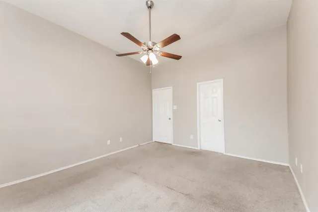a view of a room with a fan