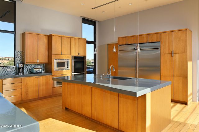 a spacious bathroom with a large tub and shower