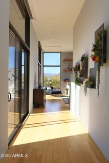 a view of living room with furniture and flat screen tv