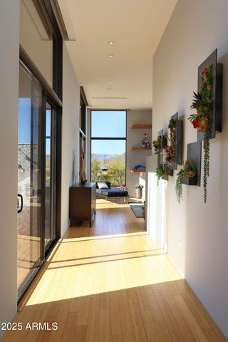 a view of living room with furniture and flat screen tv