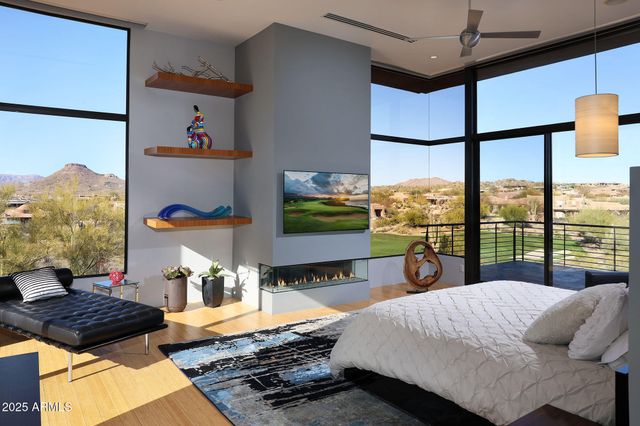 a bed room with furniture and a window