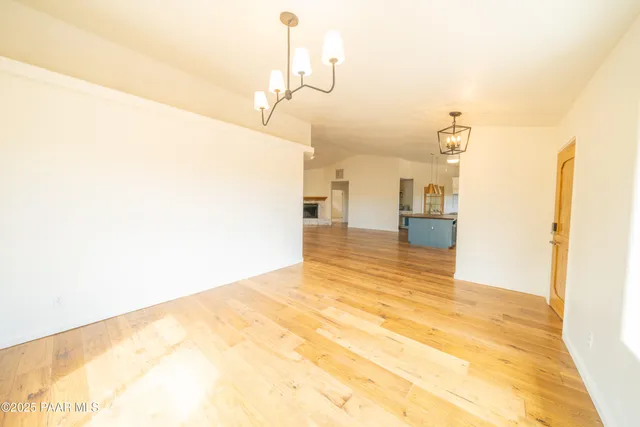 a view of a bathroom with mirror