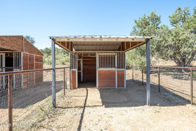 a house with trees in the background