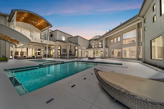 a view of a house with a swimming pool