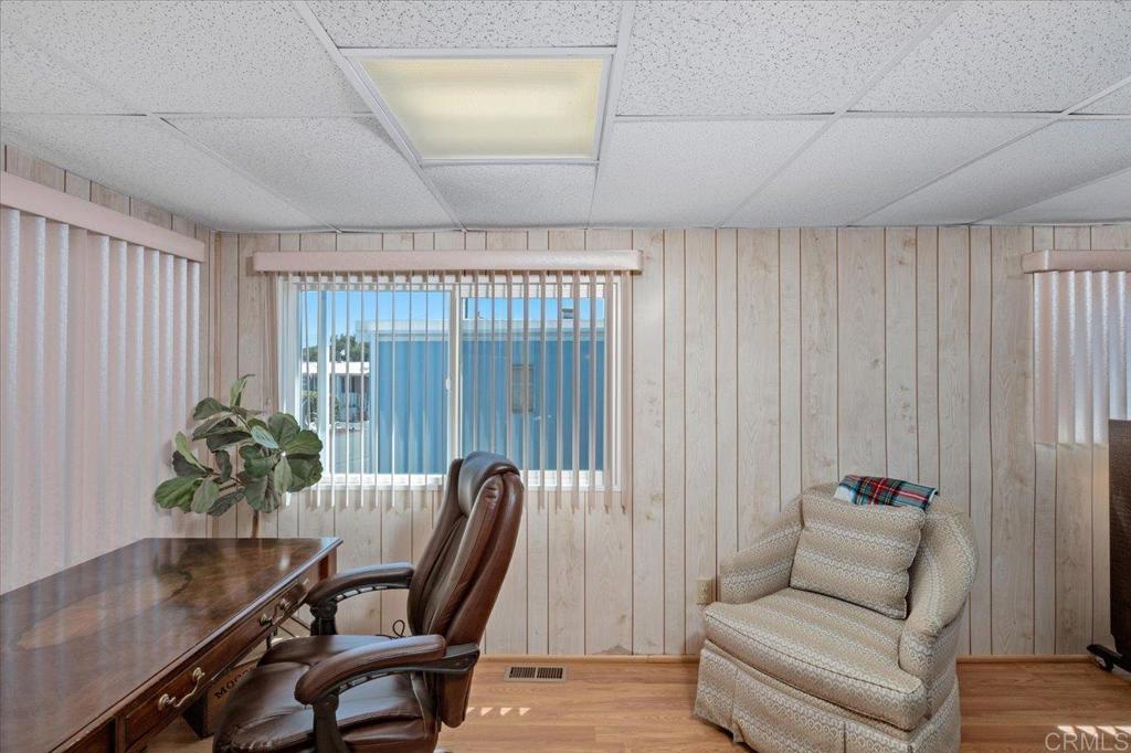 28890 Lilac Road, Unit 80 Valley Center, CA 92082 - Photo 12 of 33 a living room with furniture and a potted plant