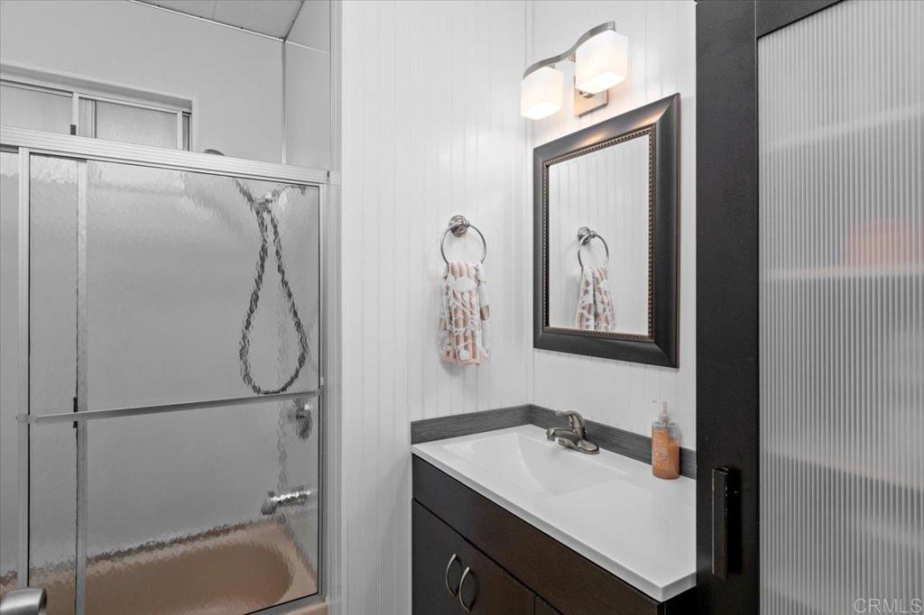 28890 Lilac Road, Unit 80 Valley Center, CA 92082 - Photo 19 of 33 a bathroom with a sink vanity mirror and toilet