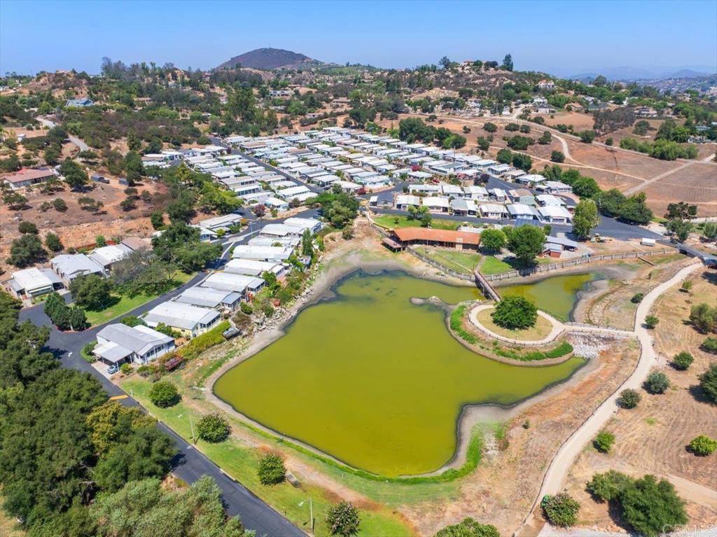 28890 Lilac Road, Unit 80 Valley Center, CA 92082 - Photo 32 of 33 an aerial view of residential house with outdoor space and swimming pool