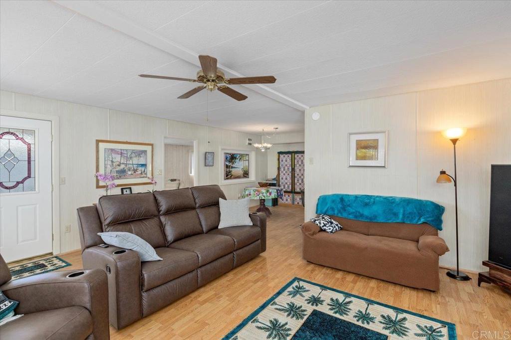 28890 Lilac Road, Unit 80 Valley Center, CA 92082 - Photo 5 of 33 a living room with furniture and a couch