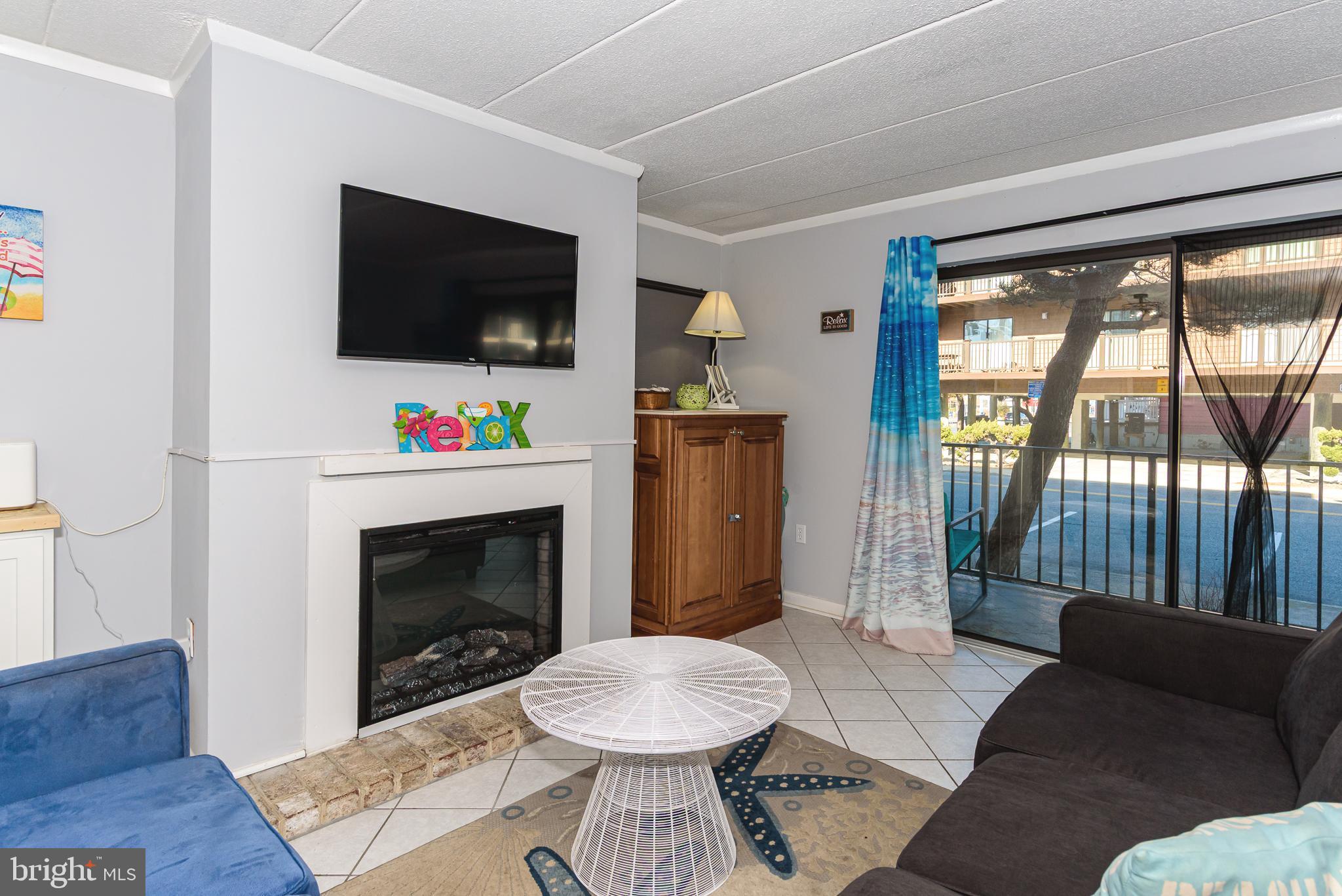 17 70th Street, Unit 18 Ocean City, MD 21842 - Photo 13 of 32 Electric fireplace