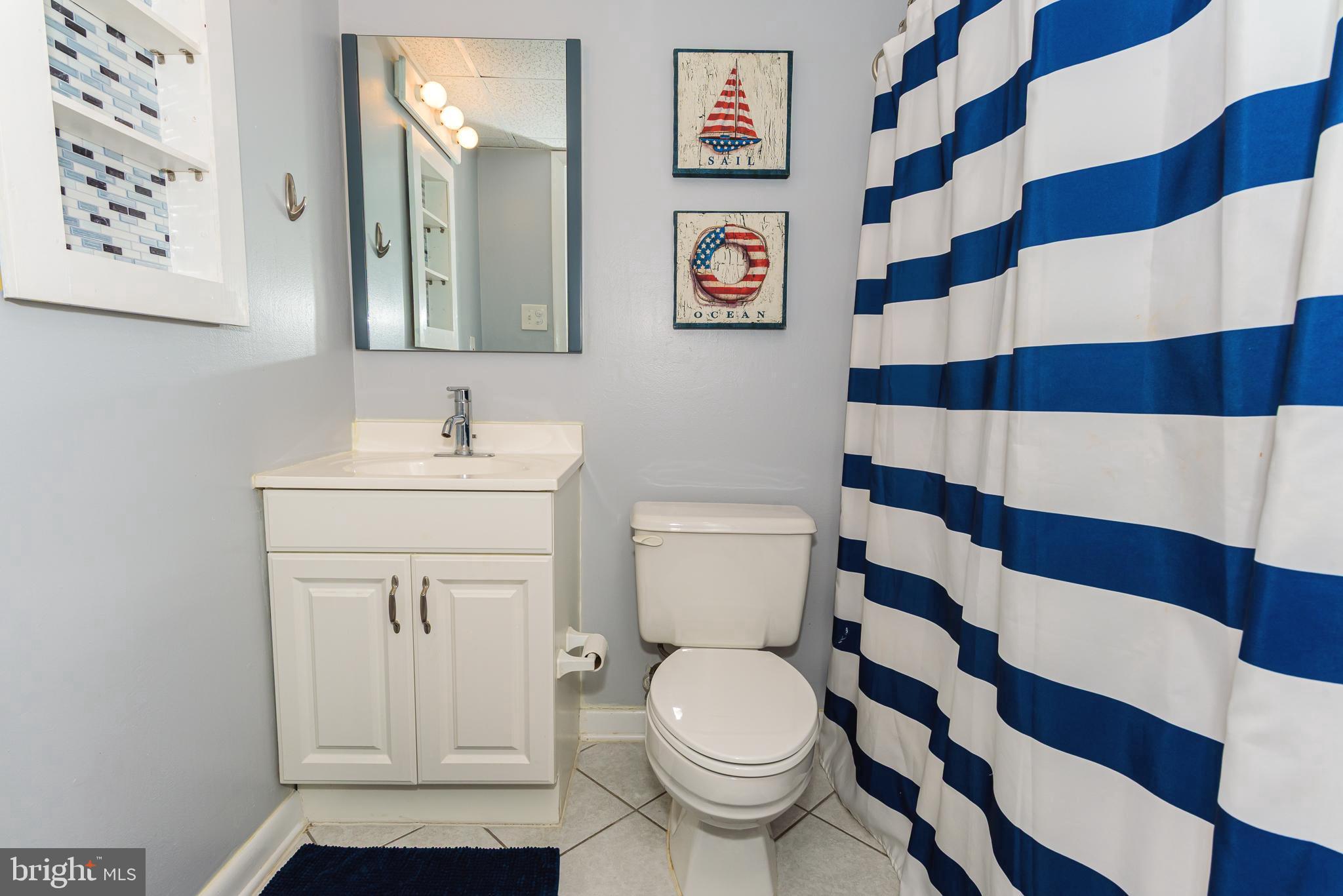 17 70th Street, Unit 18 Ocean City, MD 21842 - Photo 25 of 32 Hall bathroom