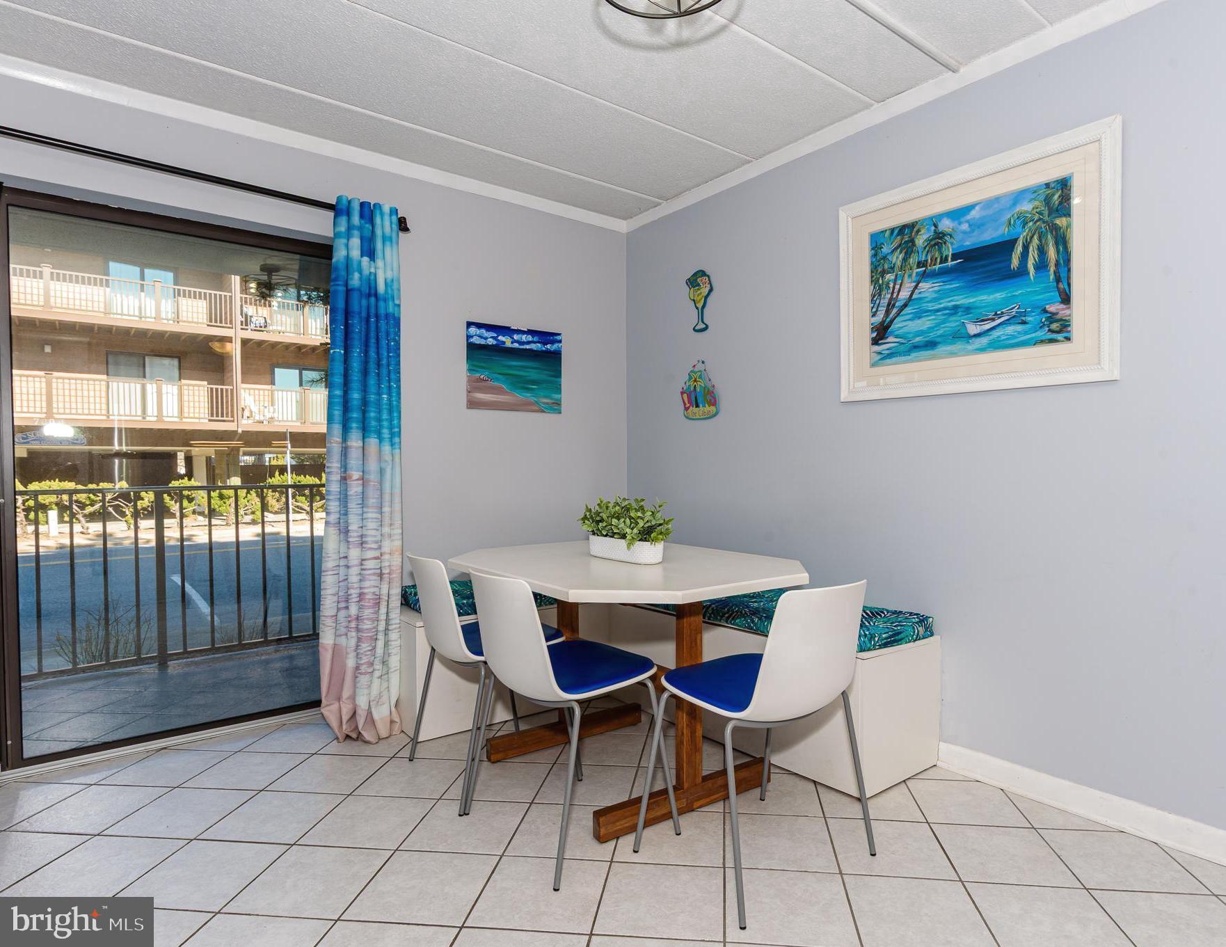 17 70th Street, Unit 18 Ocean City, MD 21842 - Photo 6 of 32 Seating benches offer add'l storage