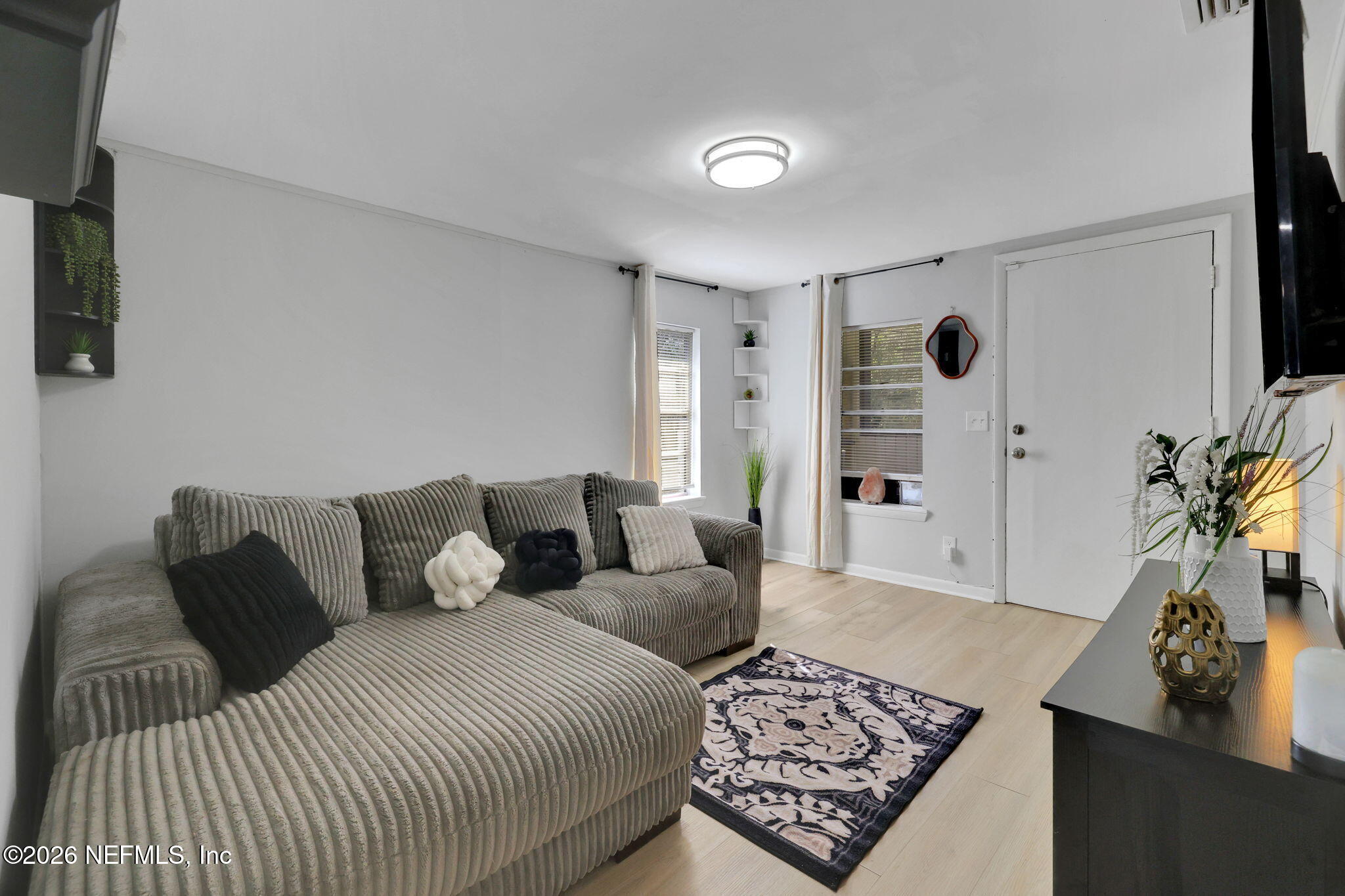 6369 Jammes Road Jacksonville, FL 32244 - Photo 5 of 21 Living Room From Kitchen View