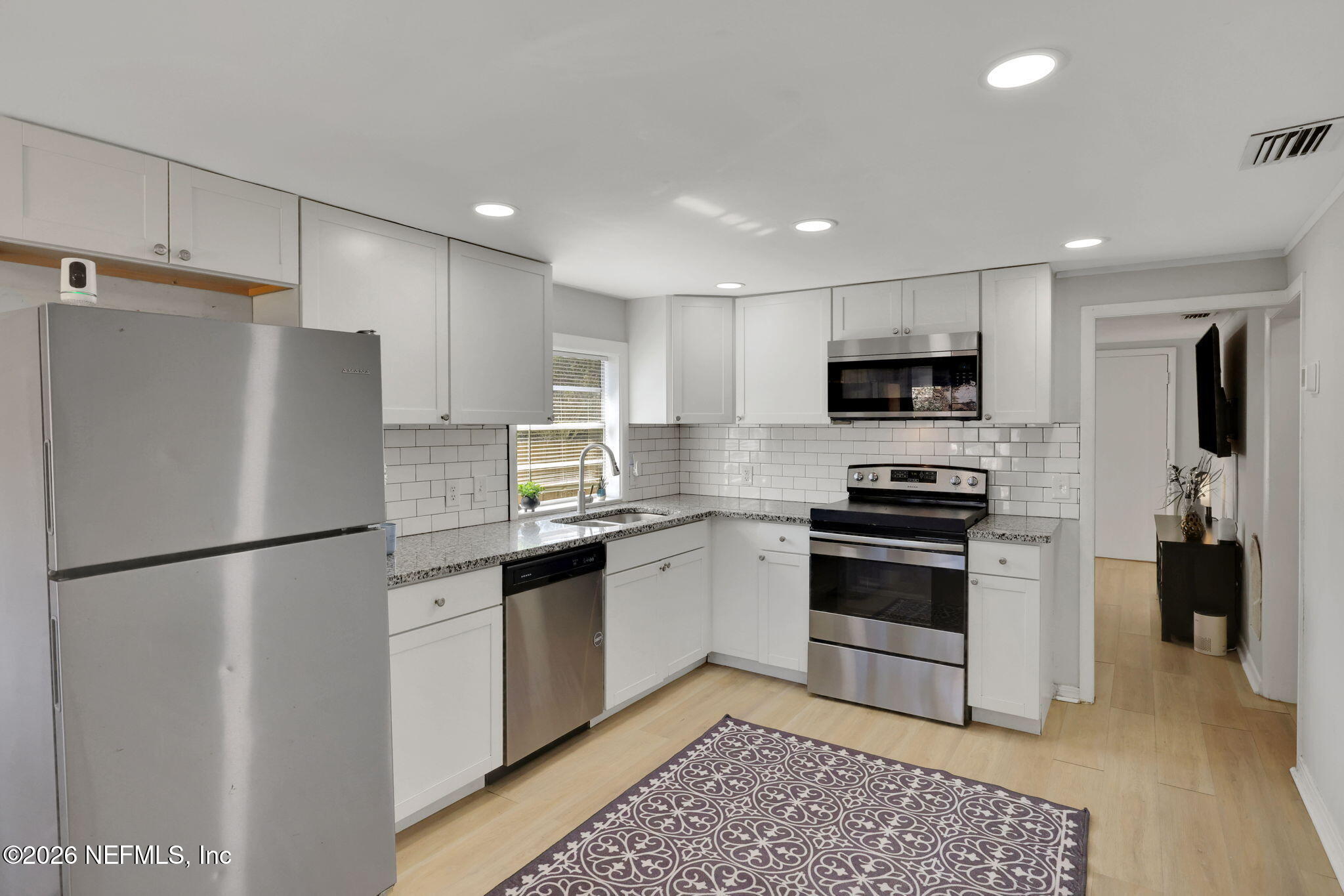 6369 Jammes Road Jacksonville, FL 32244 - Photo 7 of 21 Kitchen View from Back Door