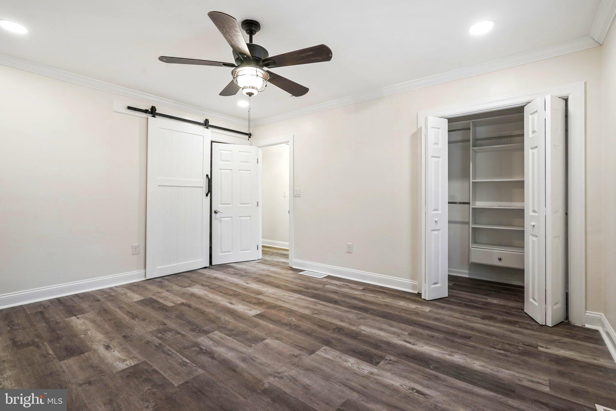 52 Summit Drive Tabernacle, NJ 08088 - Photo 18 of 27 a view of a storage & utility room with wooden floor