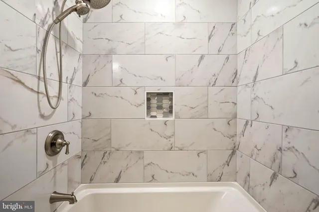 a bathroom with a bathtub