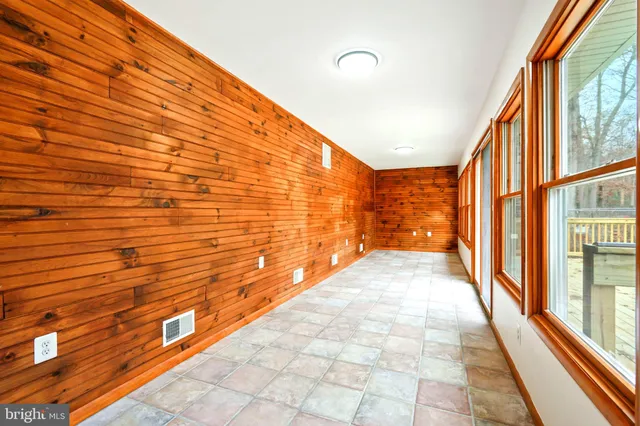 a view of hallway with a large window
