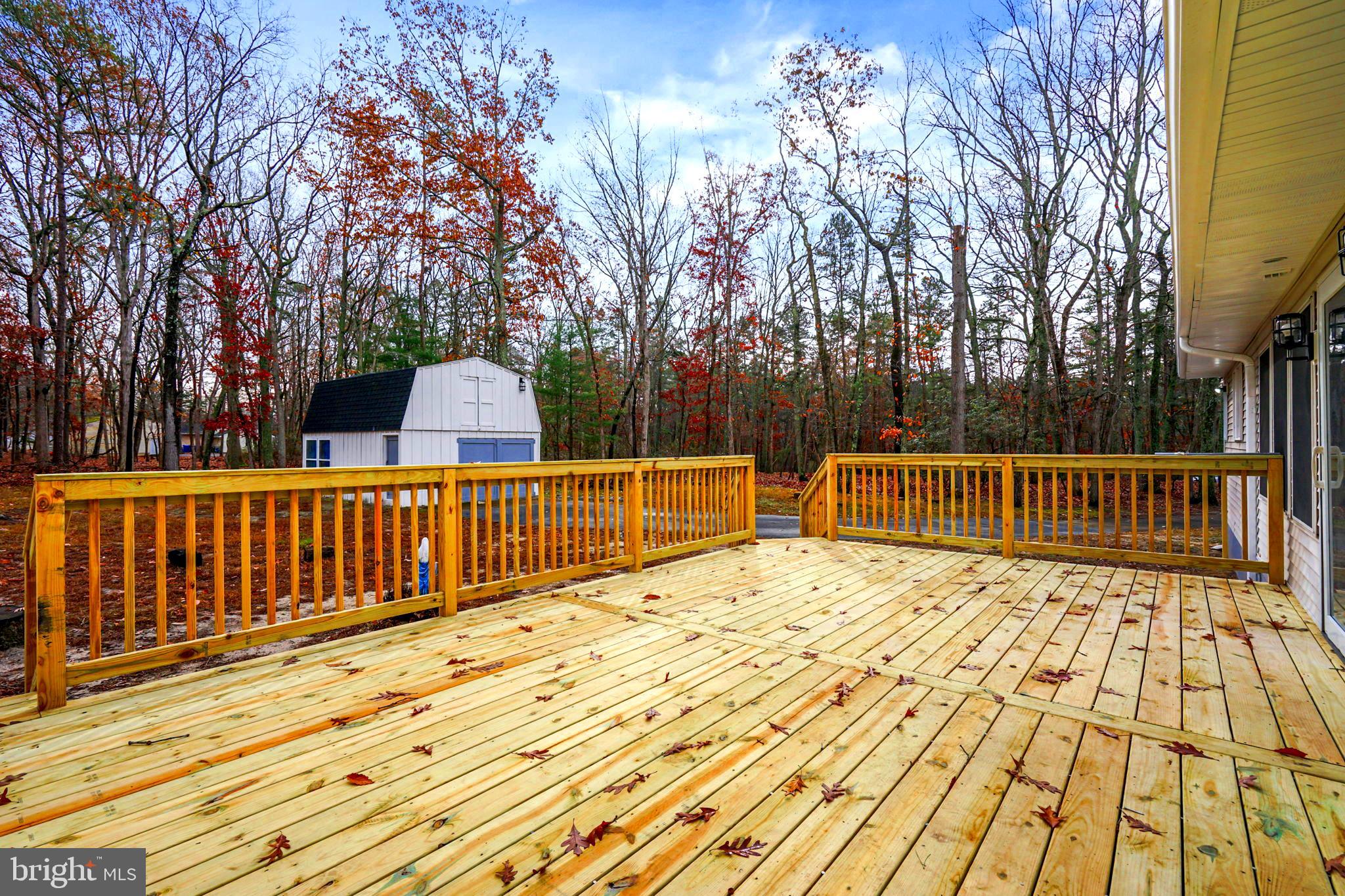 52 Summit Drive Tabernacle, NJ 08088 - Photo 25 of 27 a view of deck with wooden fence and trees