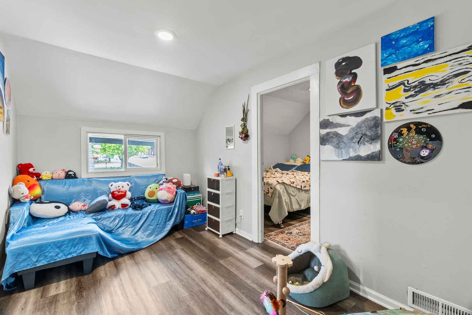 305 Irving Street Joliet, IL 60432 - Photo 12 of 20 a living room with furniture and a window