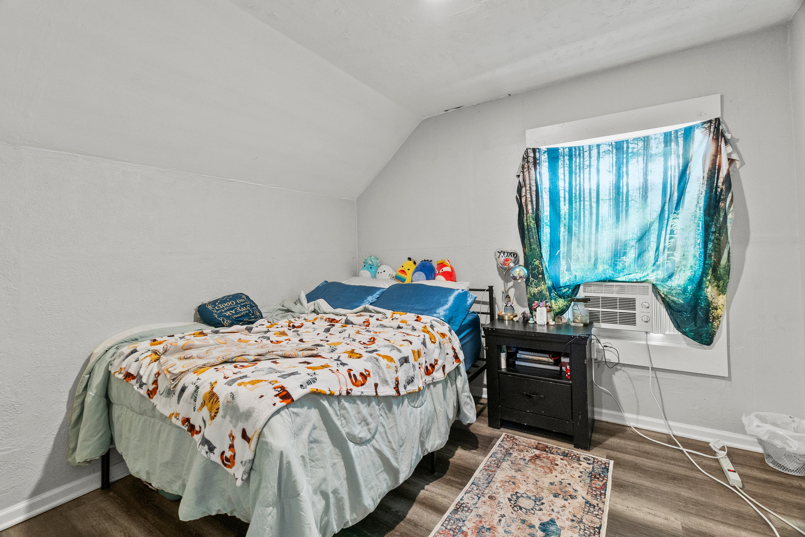 305 Irving Street Joliet, IL 60432 - Photo 16 of 20 a bedroom with a bed and a window