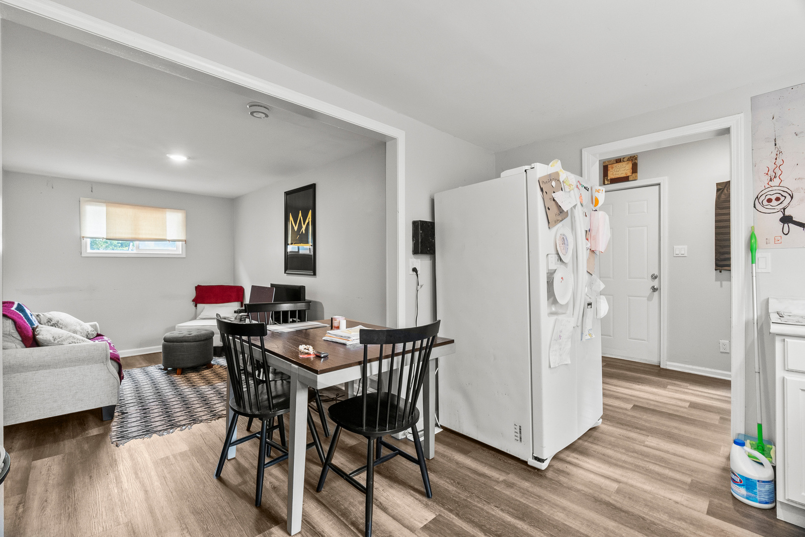 305 Irving Street Joliet, IL 60432 - Photo 5 of 20 a view of a livingroom with furniture and wooden floor