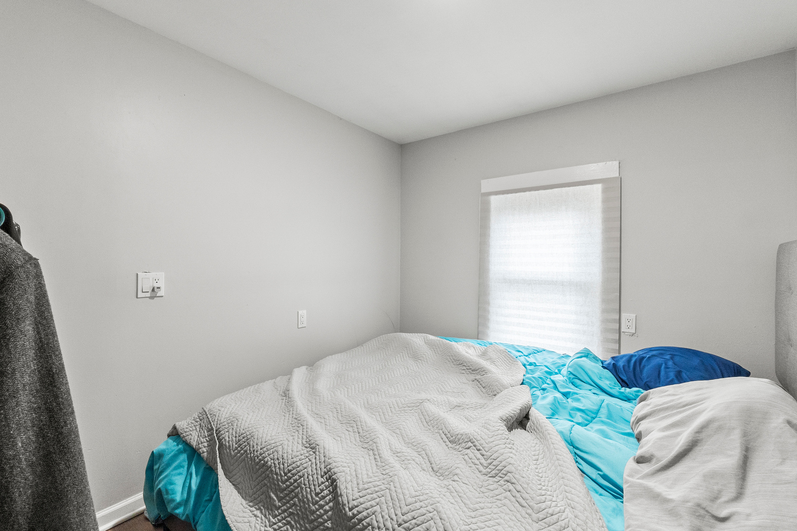 305 Irving Street Joliet, IL 60432 - Photo 7 of 20 a bedroom with a bed and a window