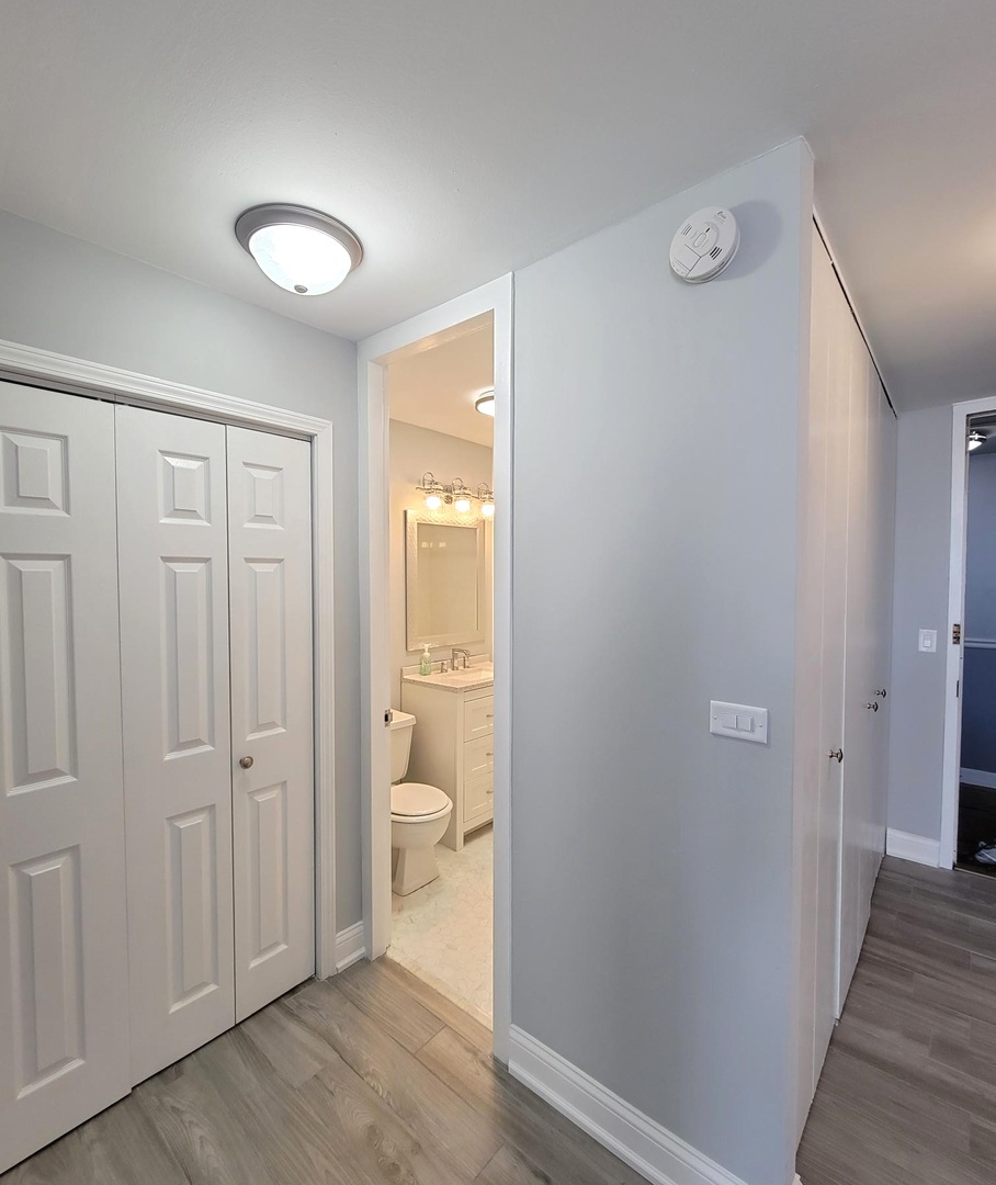 655 West Irving Park Road, Unit 2611 Chicago, IL 60613 - Photo 20 of 32 a bathroom with a toilet