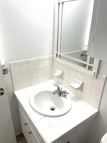 a view of a bathroom with a sink