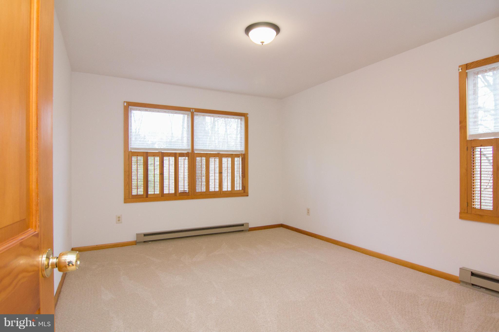 19306 Resh Mill Road Hampstead, MD 21074 - Photo 13 of 30 an empty room with a window