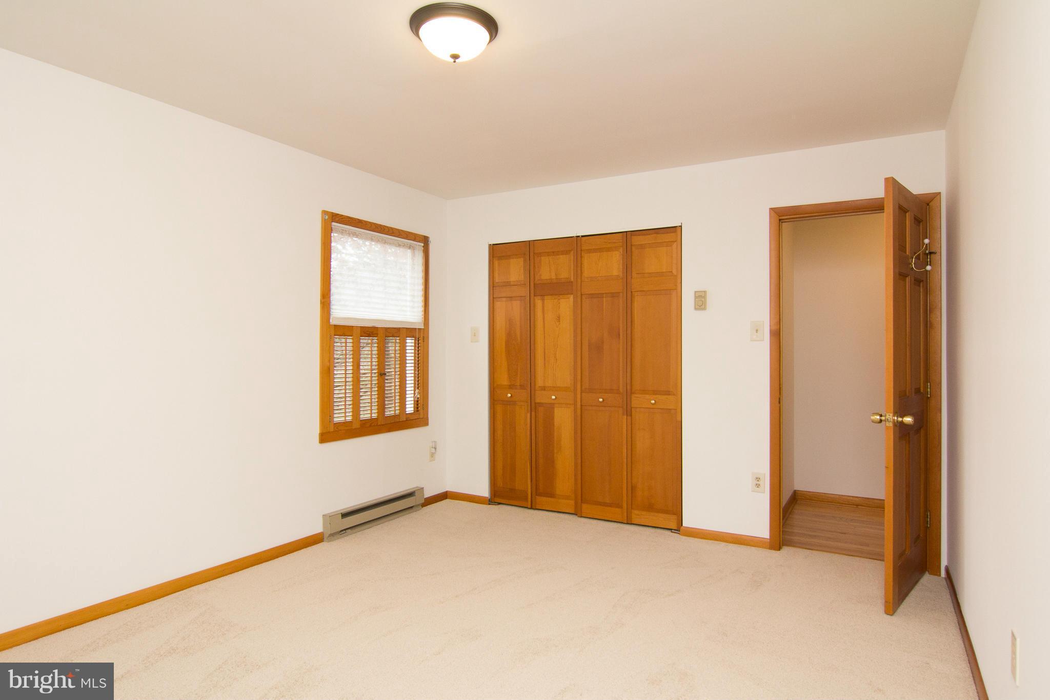 19306 Resh Mill Road Hampstead, MD 21074 - Photo 14 of 30 an empty room with windows