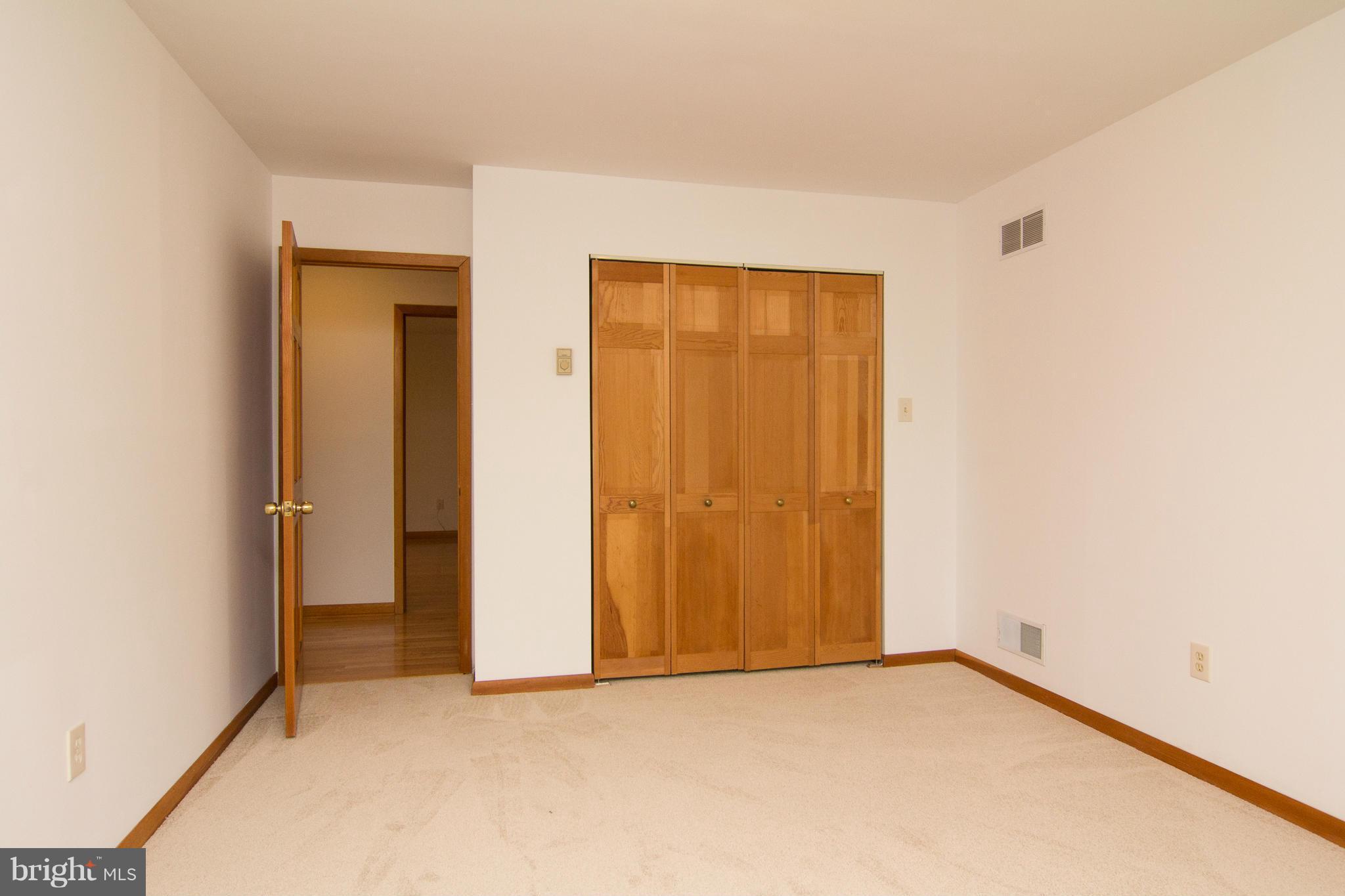 19306 Resh Mill Road Hampstead, MD 21074 - Photo 18 of 30 an empty room with closet area