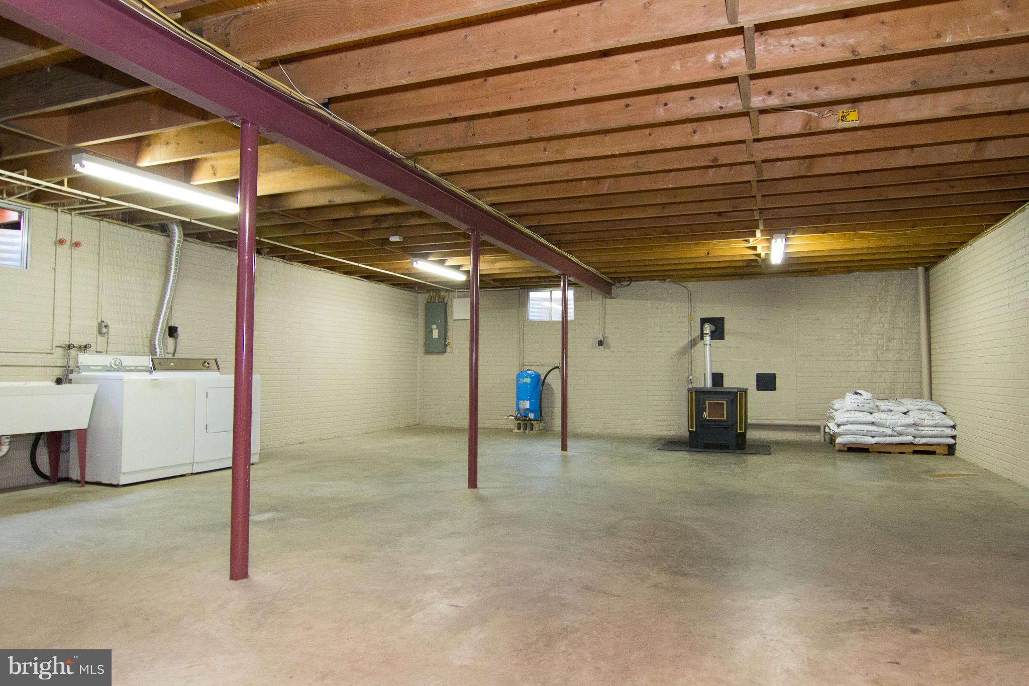 19306 Resh Mill Road Hampstead, MD 21074 - Photo 20 of 30 a view of a big room with air conditioner duct and materials on floor