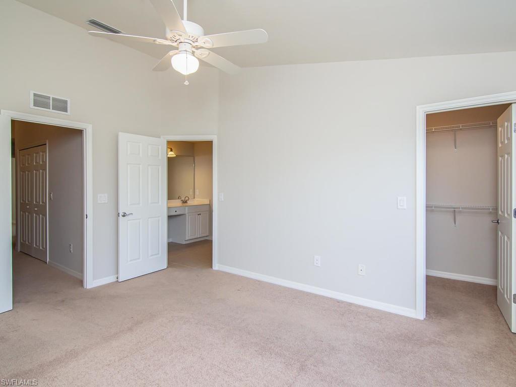 16170 Caldera Lane, Unit 37 Naples, FL 34110 - Photo 11 of 23 a view of an empty room with a ceiling fan