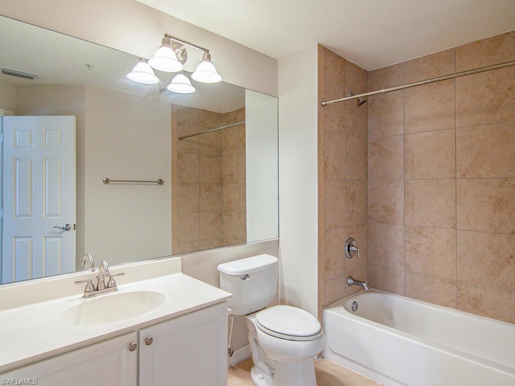 16170 Caldera Lane, Unit 37 Naples, FL 34110 - Photo 14 of 23 a bathroom with a sink toilet tub and shower