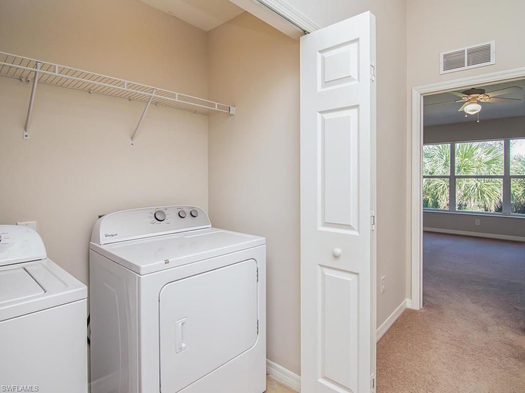 16170 Caldera Lane, Unit 37 Naples, FL 34110 - Photo 16 of 23 a utility room with dryer and washer
