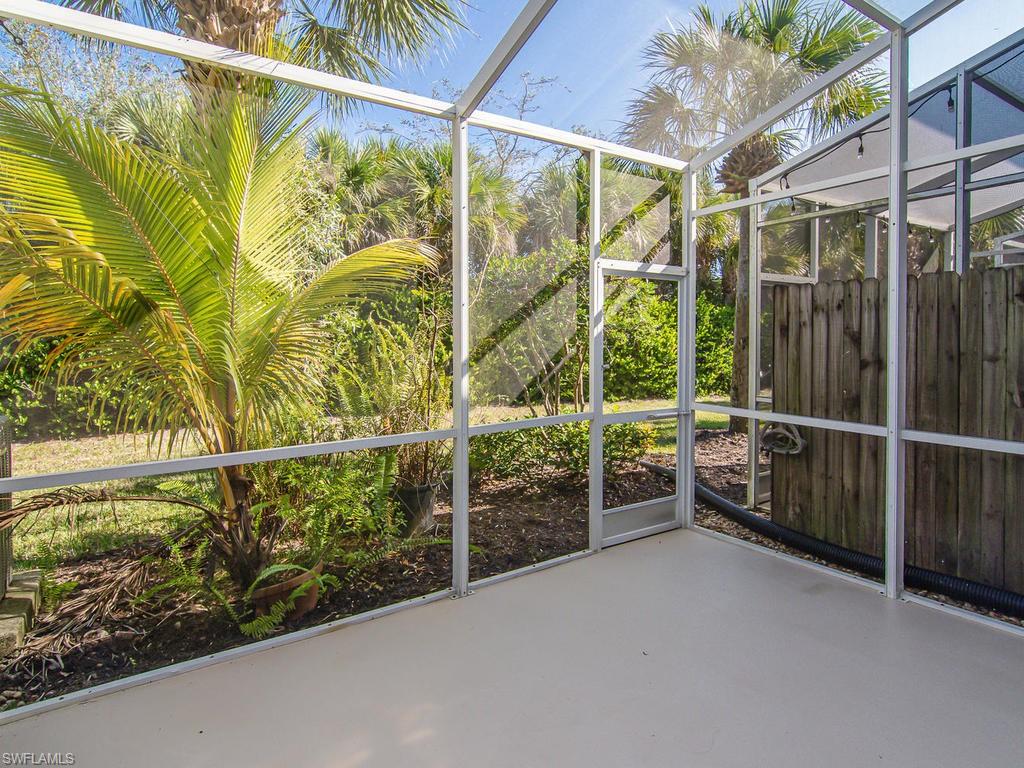 16170 Caldera Lane, Unit 37 Naples, FL 34110 - Photo 17 of 23 a view of a garden