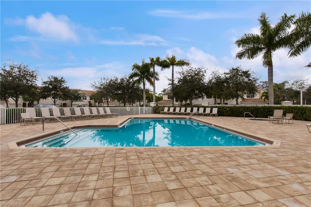 16170 Caldera Lane, Unit 37 Naples, FL 34110 - Photo 20 of 23 a view of swimming pool with outdoor seating