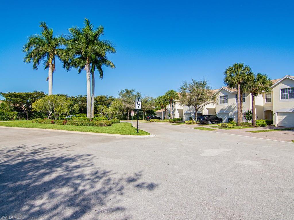 16170 Caldera Lane, Unit 37 Naples, FL 34110 - Photo 3 of 23 a view of road and houses