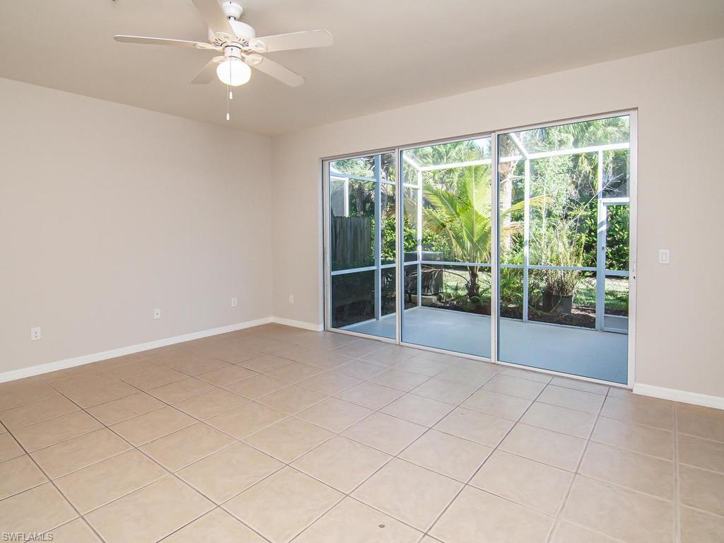 16170 Caldera Lane, Unit 37 Naples, FL 34110 - Photo 9 of 23 a view of an empty room with a window