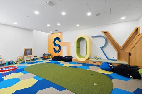 a living room with furniture and a table