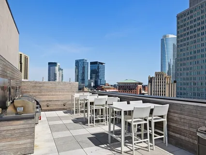 a view of a balcony with chairs