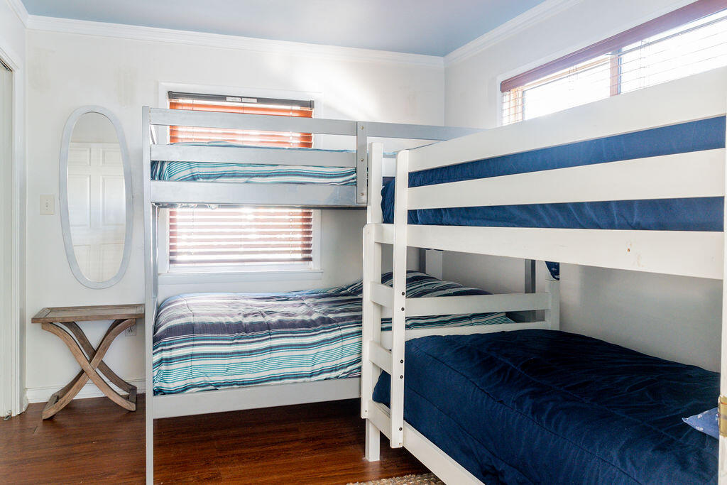 141 Miami Street Miramar Beach, FL 32550 - Photo 12 of 31 a bedroom with a bed and a window